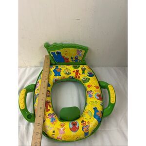 Sesame Street potty‎ seat green yellow sounds?